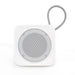The Sweet Setup - A white portable speaker with a metallic mesh grille and a wire loop for hanging.