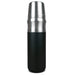The Brew & Bite - A drink bottle with a silver stainless steel top and a matte black base, featuring a logo.