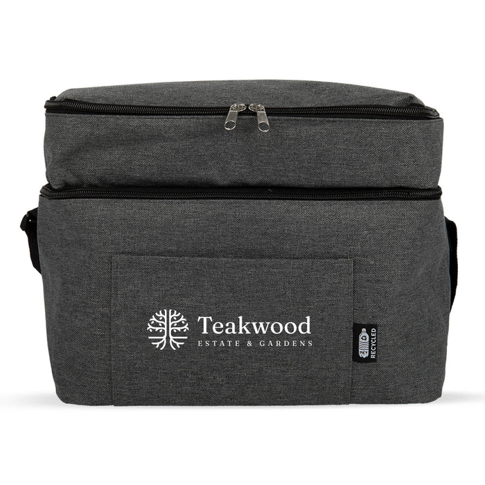 The Winter Warmer Pack - A grey insulated drink cooler with a front pocket and a logo, featuring a zippered top and adjustable strap.