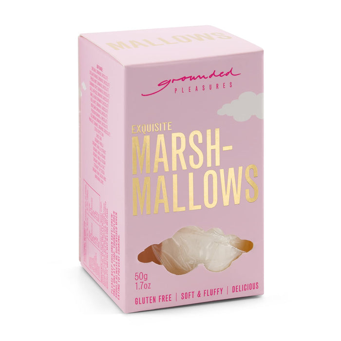 The Ultimate Welcome - Hot Chocolate Edition - A pink box of marshmallows with a fluffy, soft texture. The box features a logo and highlights gluten-free content.