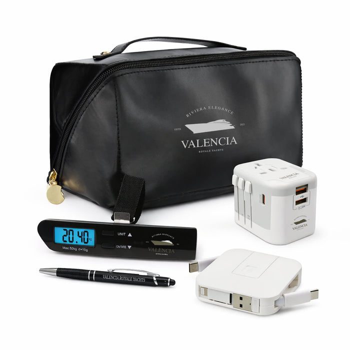 Tech Pack Travel - A black travel bag with a clock, pen, power adapter, and USB charger, featuring a logo on the bag.