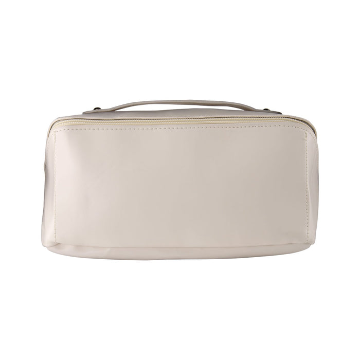 Tech Pack Travel - A cream-coloured travel bag with a zip closure and a top handle for easy carrying. Features a subtle logo.