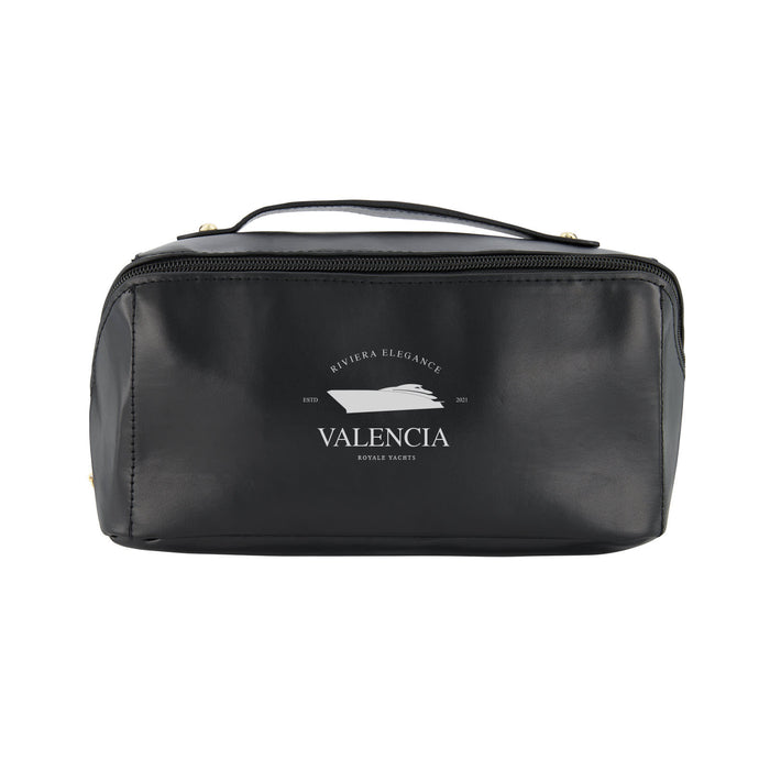 Tech Pack Travel - A black travel toiletry bag with a zip closure and a handle, featuring a logo on the front.