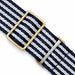 Pavilion Cooler by The Line Edit. - A navy and white striped belt featuring a gold buckle and silver metal detailing.