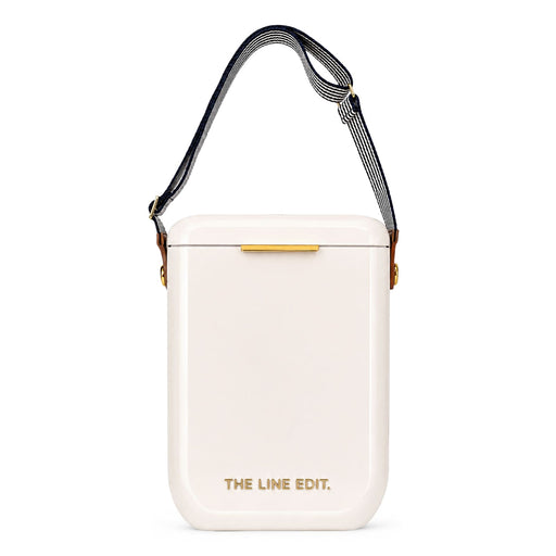 The Festive Edit Gift Set - A white insulated gift set with a gold accent and a striped shoulder strap. It features a logo on the front.