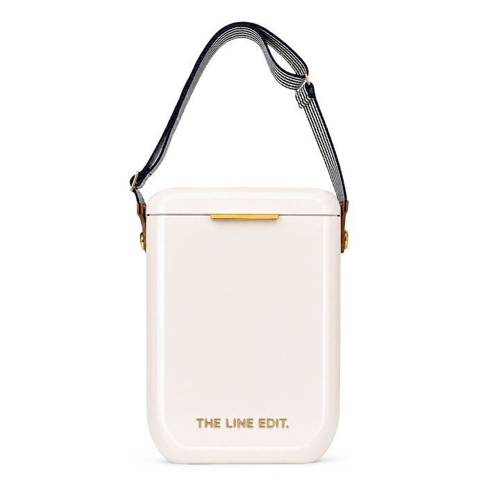 Pavilion Cooler by The Line Edit. - A white cooler with a strap and a logo, featuring a sleek and modern design.