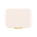 The Pour & Gather Hamper - A rectangular cooler in a sleek cream colour with a gold clasp and a logo.