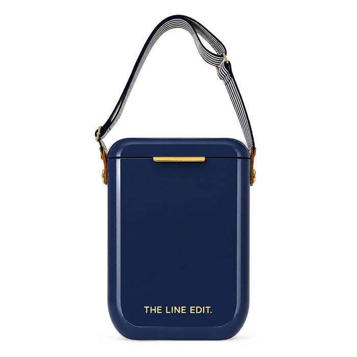 Pavilion Cooler by The Line Edit. - A navy cooler bag with a shoulder strap and a logo on the front. It has a sleek, rectangular design.