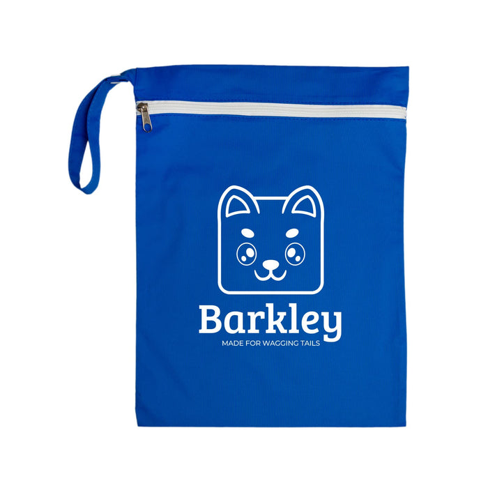 The Walkies Pack - A blue pet accessory bag featuring a white logo of a cartoon dog face and a zippered closure.