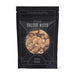 The Perfect Pairing - A snack mix bag contains salted nuts, featuring a variety of nuts in a black packaging with a logo.