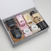 The Big Indulge - A gift box featuring an assortment of sweets and snacks, including pretzels, marshmallows, Turkish delight, and fudge.