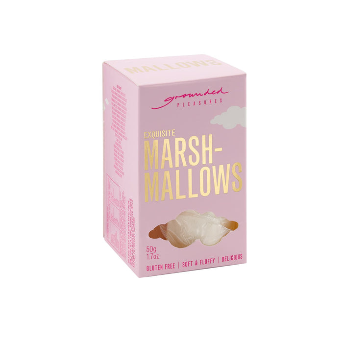 The Big Indulge - A pink box containing exquisite marshmallows, featuring fluffy white treats inside. The box has a logo and gluten-free label.