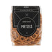 The Treat Kit - A clear bag of crunchy and salted pretzels in a brown and black packaging, featuring a logo.