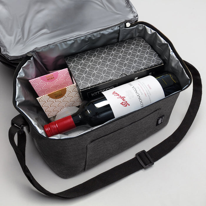The Wine & Unwind - A drink bottle bag in grey containing a bottle of red wine and two other boxed items, with a silver interior.