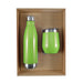 Pura Cardboard Gift Set - A green drink bottle and matching cup are arranged in a cardboard gift box. The bottle has a stainless steel bottom.