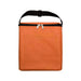 The Gone Fishing Pack - An orange zippered bag with a handle and a front pocket. Features a simple design for outdoor use.