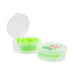 Silicone Straw in Case - A green silicone straw neatly coiled inside a clear case with a round lid featuring a logo.