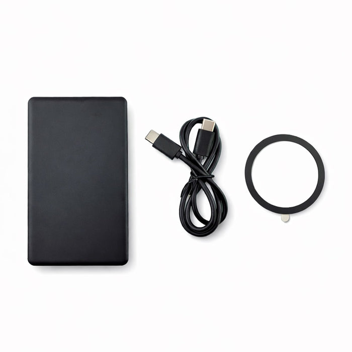 Axial by Nomis Solid State Power Bank - A black solid state power bank, a USB-C cable, and a circular accessory. The product features a logo.