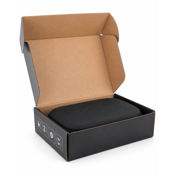 Aero by Nomis Headphones - A black headphone case inside an open cardboard box, featuring a simple design with a logo.