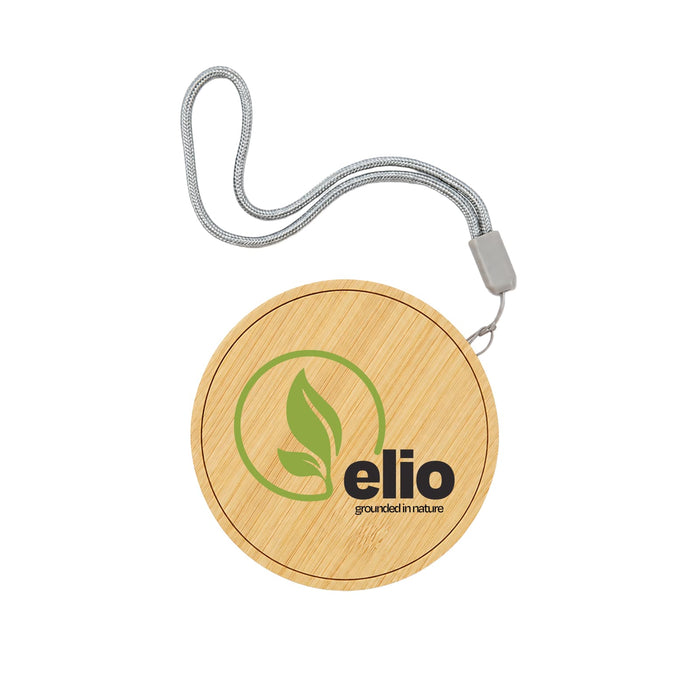 Reveal Circle Wireless Charger Set - A bamboo wireless charger with a circular design and a silver strap, featuring a logo on the surface.