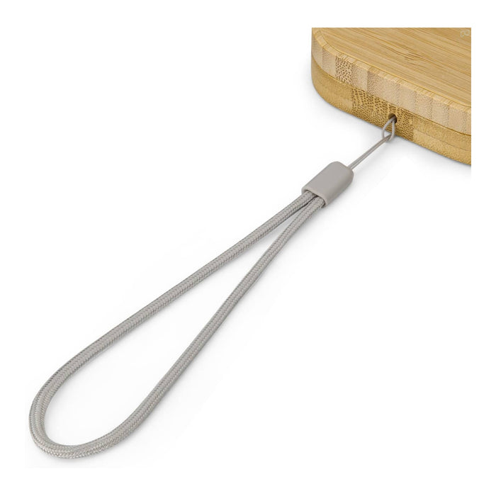 Reveal Square Wireless Charger Set - A wireless charger with a bamboo surface and a grey strap attached for easy handling.