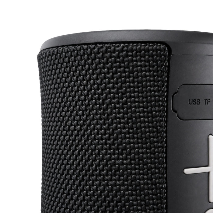 Delta 8W Speaker - A black speaker with a textured surface and control buttons on the side, featuring a USB port.