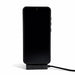 Ultra Power Cable - A black smartphone set on a stand with a charging cable connected, featuring a logo on the cable.