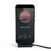 Ultra Power Cable - A smartphone displaying a music player interface, connected to a charging cable. The phone is in a protective case.