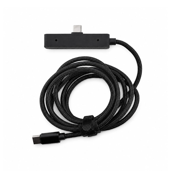 Tech Pack Charge - A black charging cable with a textured finish and a connector at each end, featuring a logo.
