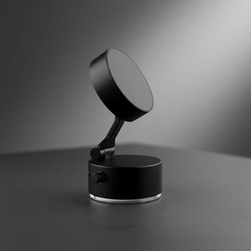 Ajustable Magnetic Mobile Stand - A black adjustable magnetic mobile stand with a round base and a swivelling top.