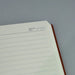 Vienna Notebook A5 - A brown A5 notebook with lined pages and a space for memo number and date at the top.