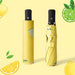 Full Colour Poppins Umbrella - A yellow umbrella with lemon and lime designs, featuring a black handle and a compact storage sleeve.
