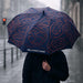 Full Colour Corporate Umbrella - A full colour umbrella with a navy blue design featuring various logos and a geometric pattern.