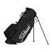 Titleist Players 5 Stand Bag - A black stand bag featuring a logo, designed for golf with adjustable legs and multiple compartments.