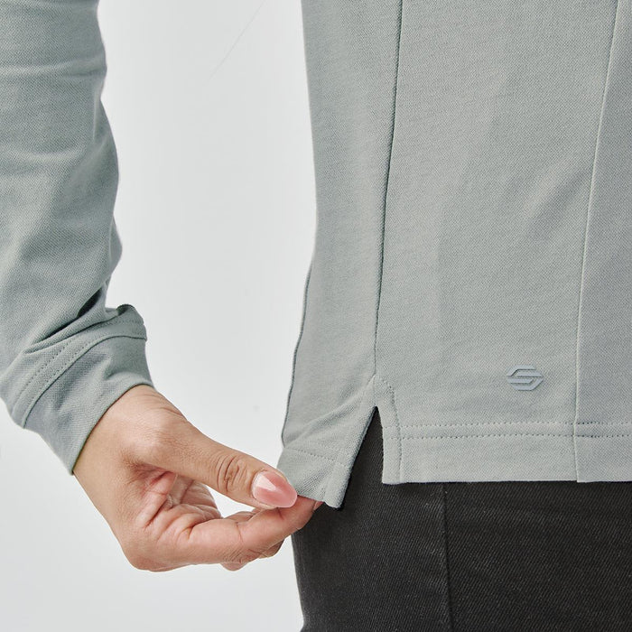 Women's Nevada L/S Micro Pique Polo - A light grey long sleeve polo shirt, featuring a side slit detail and a logo on the hem.