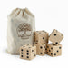 Wooden Yard Dice set - A set of five wooden yard dice in a natural fabric bag, featuring black dots and a logo.