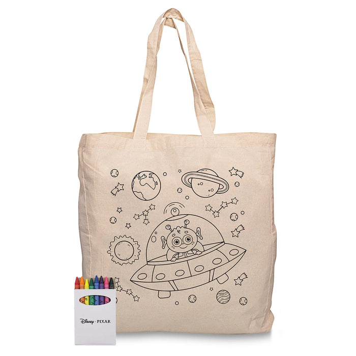 Squiggle Calico bag + Crayon set - A cream calico tote bag featuring a space-themed colouring design, alongside a set of colourful crayons.