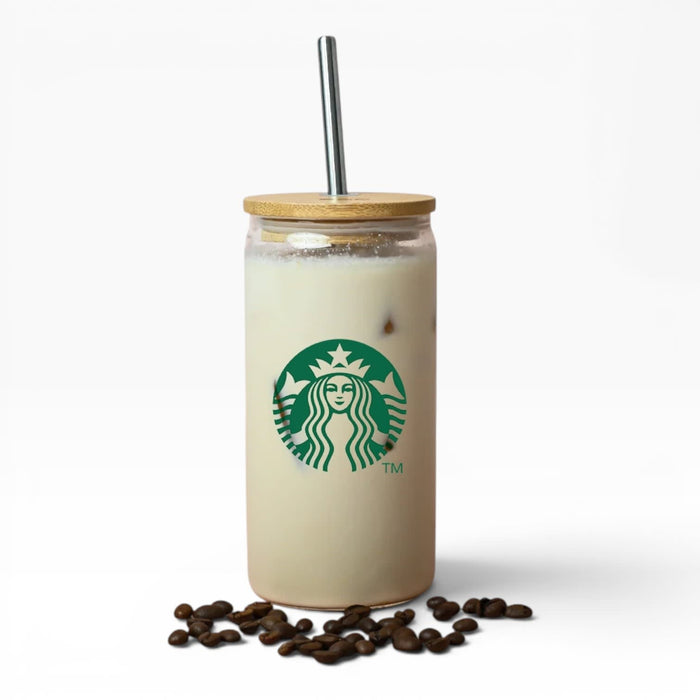 Carnaby 500ml Tumbler - A drink bottle with a bamboo lid and metal straw, featuring a logo and filled with a creamy beverage, placed on coffee beans.