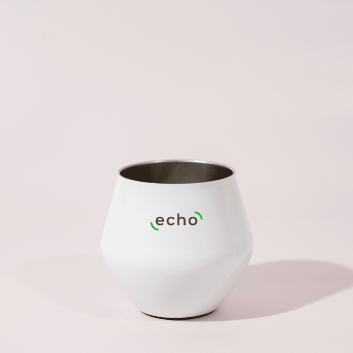 Shiraz Detachable Wine Glass - A white, detachable wine glass with a sleek design and a logo on the front.