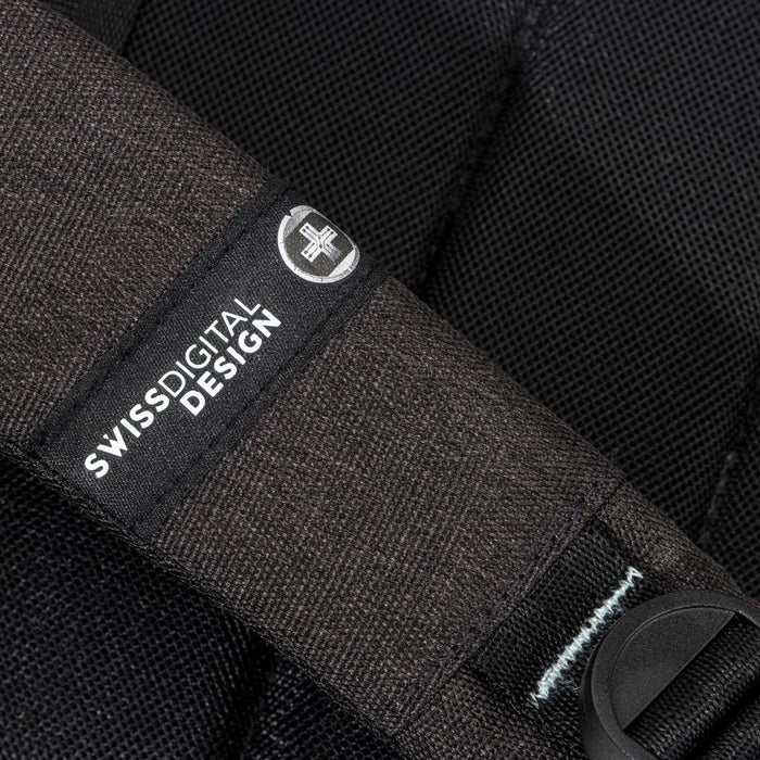 Swissdigital Arosa Backpack - A black Swissdigital Arosa Backpack featuring textured fabric and a branded strap.