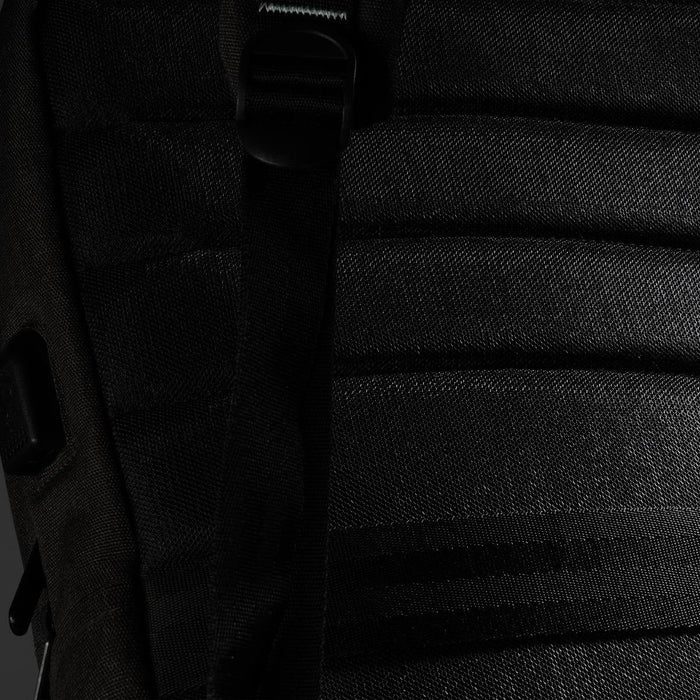 Swissdigital Arosa Backpack - A black backpack featuring textured fabric and adjustable straps, with a logo on the side.