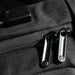 Swissdigital Arosa Backpack - A close-up of a black Swissdigital Arosa Backpack featuring sturdy zippers and a logo on the fabric.