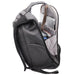 Swissdigital Bolt Anti-Theft Backpack - A grey anti-theft backpack with compartments for a laptop, drink bottle, and other items. It has a sleek, modern design.