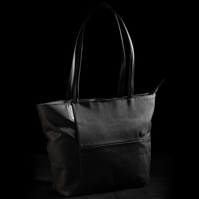 Swissdigital Arosa Tote Bag - A black tote bag with leather handles and a front pocket, featuring a logo on the side.