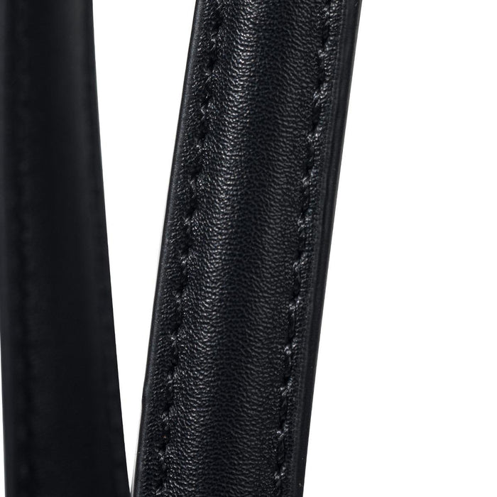 Swissdigital Arosa Tote Bag - Close-up of a black, textured strap from a tote bag, featuring detailed stitching. The bag has a logo on it.