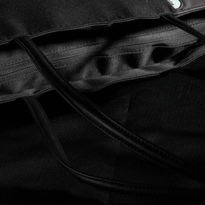 Swissdigital Arosa Tote Bag - A black tote bag featuring interior pockets and long handles, with a logo on the exterior.