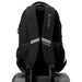 Swissdigital Vector Backpack - A black Swissdigital Vector Backpack featuring padded straps and a logo, resting on a suitcase.