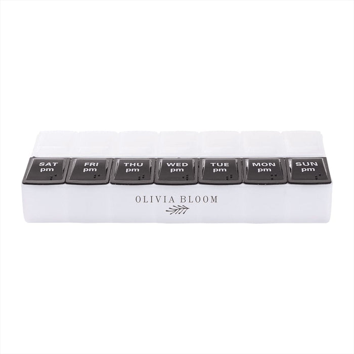Recycled AM/PM Pill Case - A clear pill case with eight compartments labelled for days of the week, featuring black lids and a logo.
