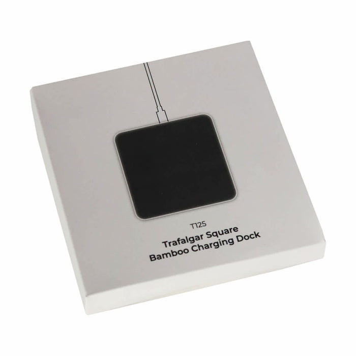 Trafalgar Bamboo charging dock - A square bamboo charging dock in a sleek white packaging with a black surface and logo.