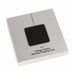 Trafalgar Bamboo charging dock - A square bamboo charging dock in a sleek white packaging with a black surface and logo.